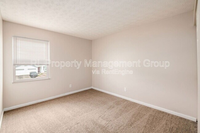 Building Photo - 7179 Feather Ct