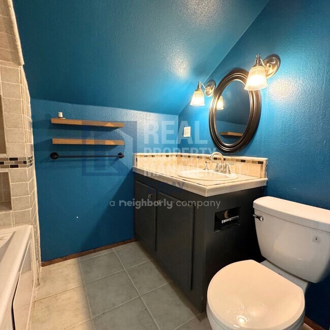 Building Photo - Sweet 3 bedroom and 2 bath + 3 car garage ...