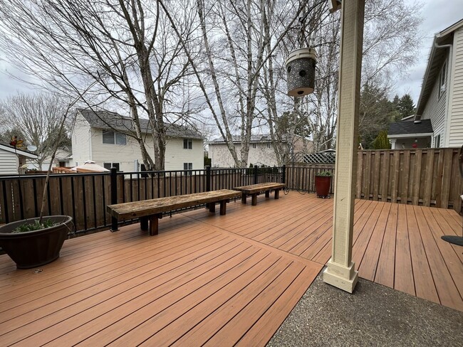 Building Photo - Inviting Two-Story 3BR Home Featuring New Carpet, New Stainless Appliances, Spacious Garage Stora...