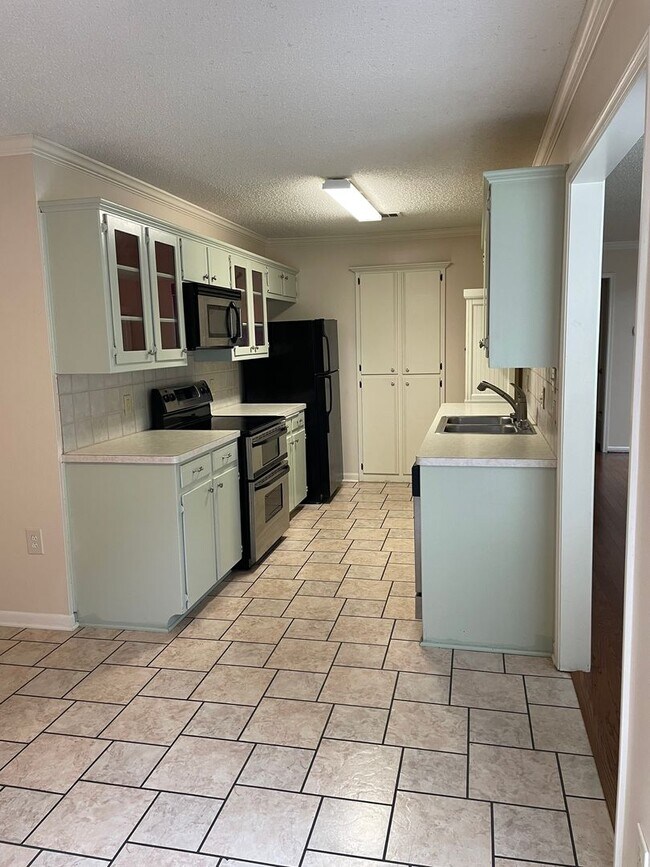 Building Photo - Available Now! Charming 2-Bedroom, 2-bath Landon Branch Townhome with Private Courtyard and Prime...