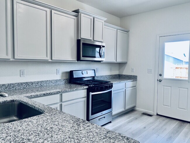 Building Photo - Charming Ranch Home in Bennett Crossing! Features 3 Beds/2 Baths and Large Fenced Backyard.