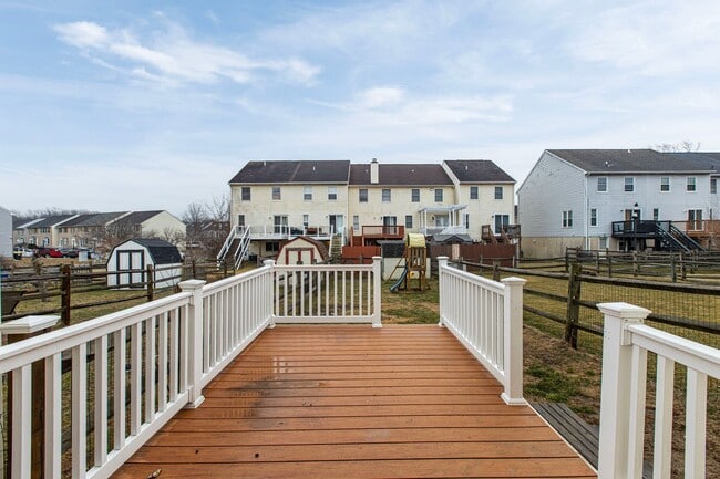 Building Photo - Move-In Ready 3BR Townhome – Deck, Yard & Finished Basement *OPEN HOUSE 3/14/26 1PM-3PM *