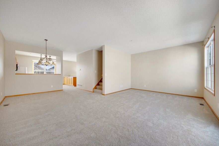 Combined Living and Dining Room view - 10022 Gentian Dr