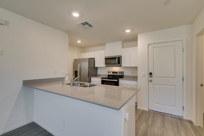 Building Photo - Gorgeous Townhome with upgrades in gated community* 3 large bedrooms, 2 car garage*Community pool...