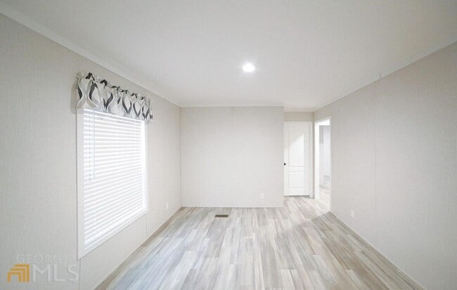 Building Photo - Spacious 4-Bedroom Home with Lawn Maintena...