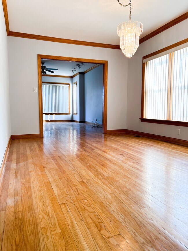 Dining room with hardwood floor - 6042 W Miami Ave