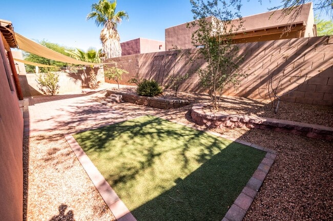 Building Photo - Gorgeous 3 Bedroom 2 Bathroom Home with Tile Throughout! Central A/C, 2 Car Garage!