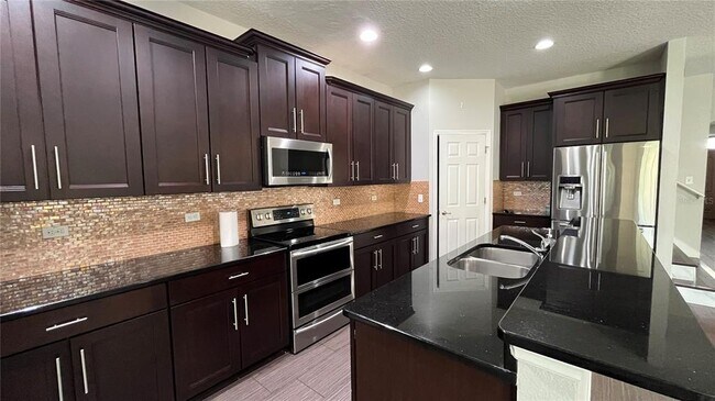 Building Photo - 6031 Roseate Spoonbill Dr