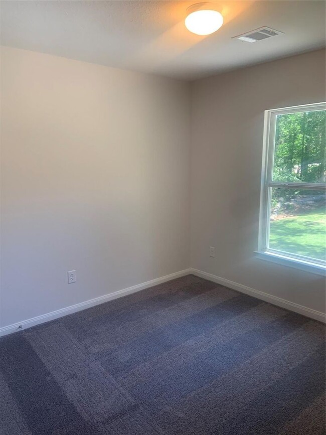 Building Photo - This home is a brand new beauty tucked bac...