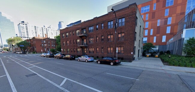 Building Photo - "Charming Studio Retreat with Hardwood Elegance in Downtown Minneapolis!"