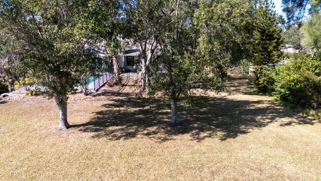 Building Photo - Country-Style Sarasota Living on a Full Acre - Pool Home with Oversized Workshop — Move-In Ready Now