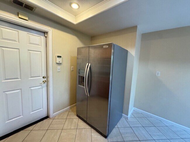 Building Photo - Beautiful updated 2 Story condo in Main Chance Estates w/attached 2 car garage!