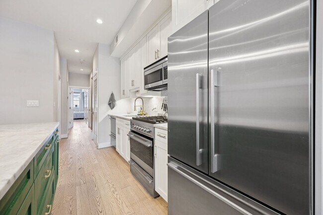 Building Photo - Renovated 2bed-2bath Near H-Street with Private Deck & EV Parking!