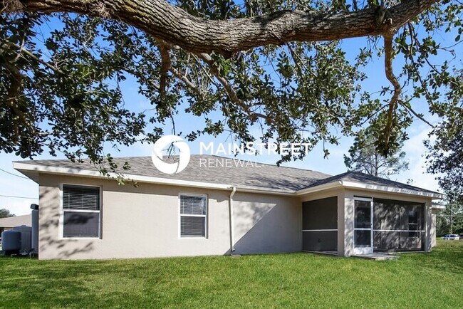 Building Photo - 3 Bedroom Pet-Friendly Home in Lehigh Acre...