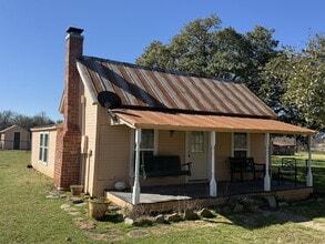 Building Photo - Unique country living in fully furnished cabin! Easy drive to Stephenville.