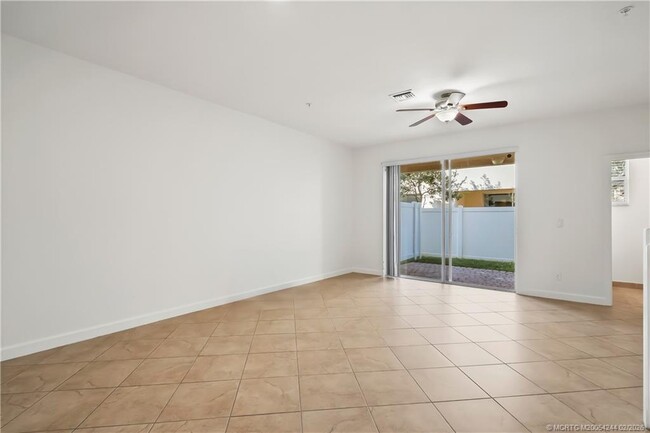 Building Photo - 9512 SW Merlin Ct