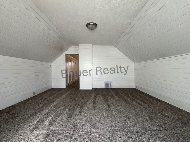Building Photo - Renovated Three Bedroom Home