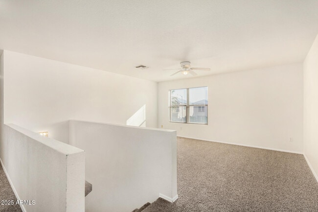 Building Photo - 15554 W Gelding Dr