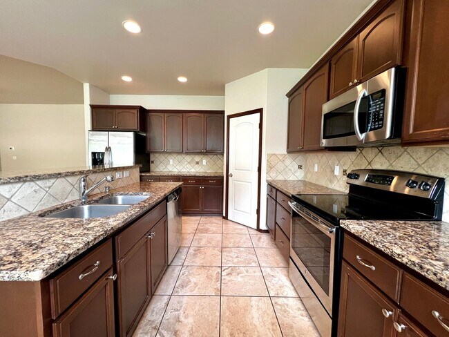 Building Photo - Home in West Valley with garage & back yard!