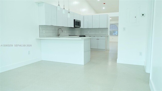 Building Photo - 5661 W 21st Ave