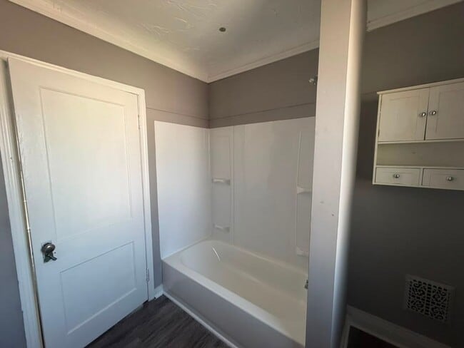 Building Photo - Four bedrooms. A sunroom. A fenced yard. A garage. Your next home is ready to be discovered!