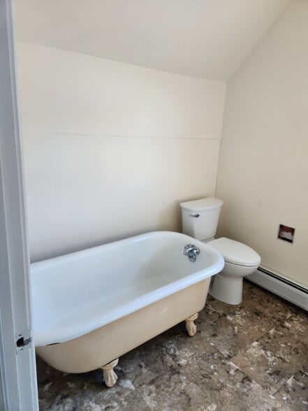 bathroom with tub - 115 Center Rd