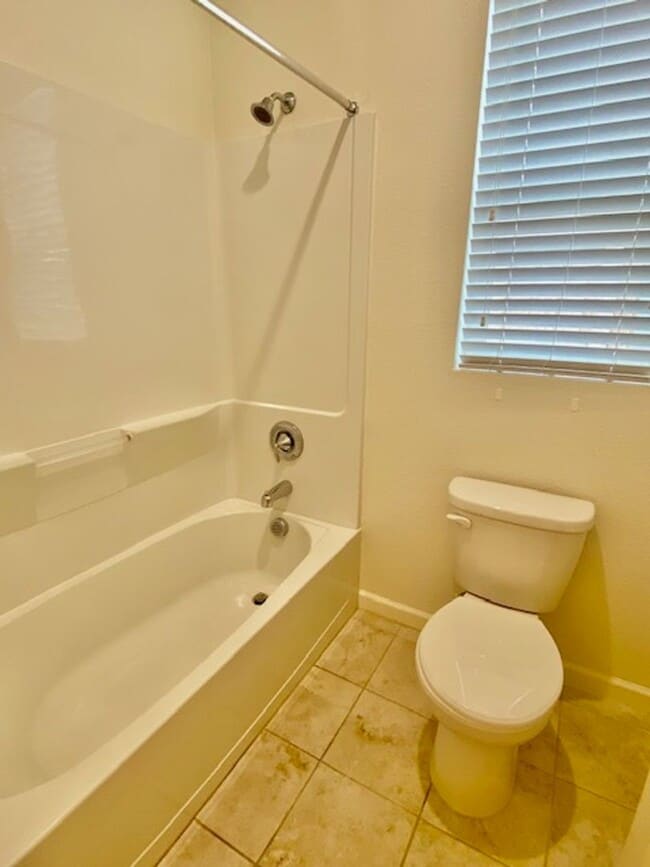 Building Photo - ALMOST NEW, UNIQUE 4 BEDROOM, 3 BATH, 2 CA...