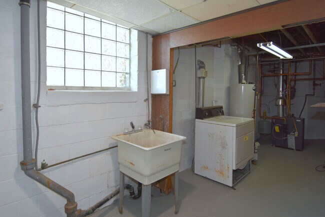 Laundry area with new furnace - 121 Owendale Ave