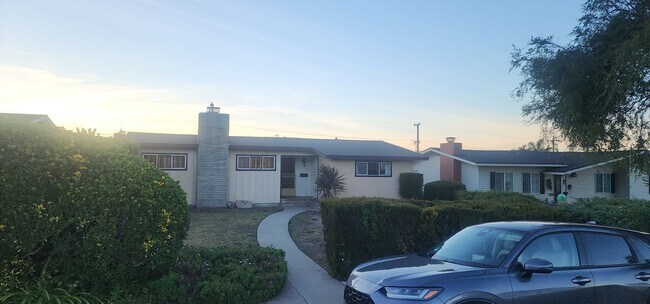 Building Photo - This is a spacious house featuring four bedrooms and two bathrooms, along with a two-car garage.