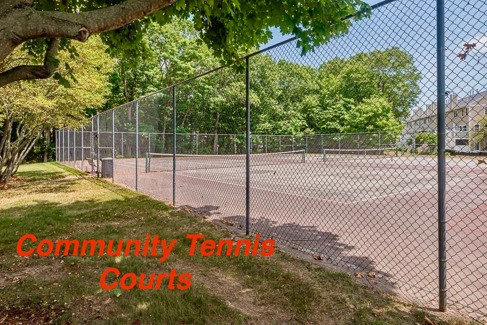 Tennis courts for community use next to garden spaces for community use with sign-up - 11 Devon Club Ln