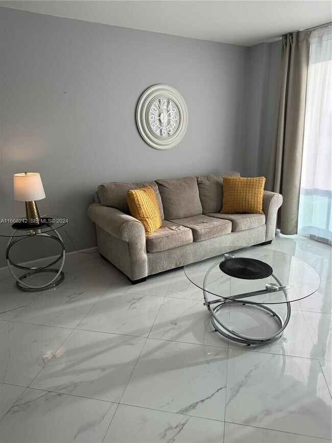 Building Photo - 19370 Collins Ave