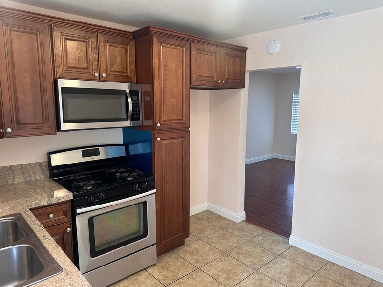 Kitchen with new cabinets - 1654 E Ontario Ave