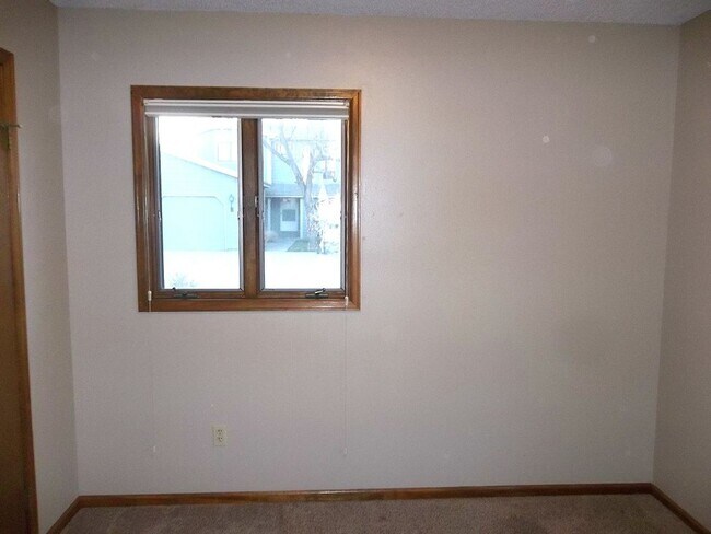 Building Photo - $500 OFF First Month | Charming 2BR Townhome with Garage