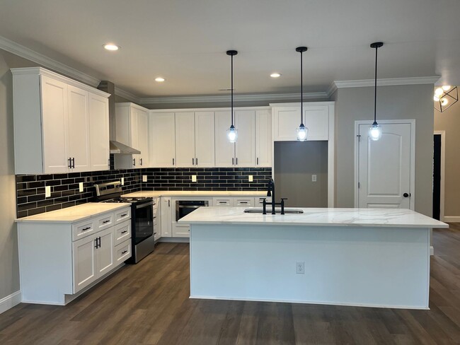 Building Photo - Three bedroom, 2.5 bath new construction a...