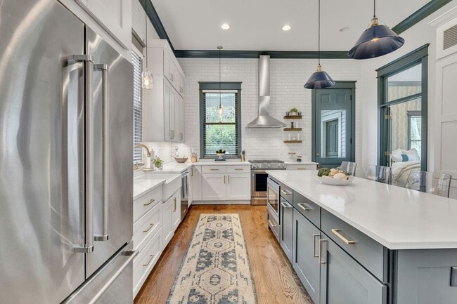 Building Photo - AVAILABLE SEPTEMBER 1ST. Beautifully Restored and FULLY Furnished professionally decorated East N...