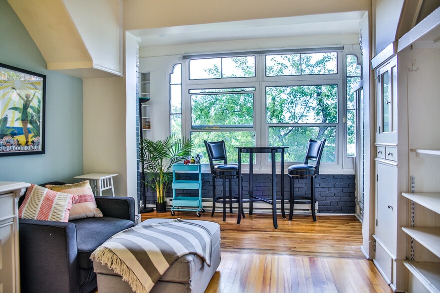 open living room with large bright windows - 726 East 16th Avenue