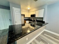 Building Photo - Cozy 2 Bedroom 1 Bathroom Condo Available ...