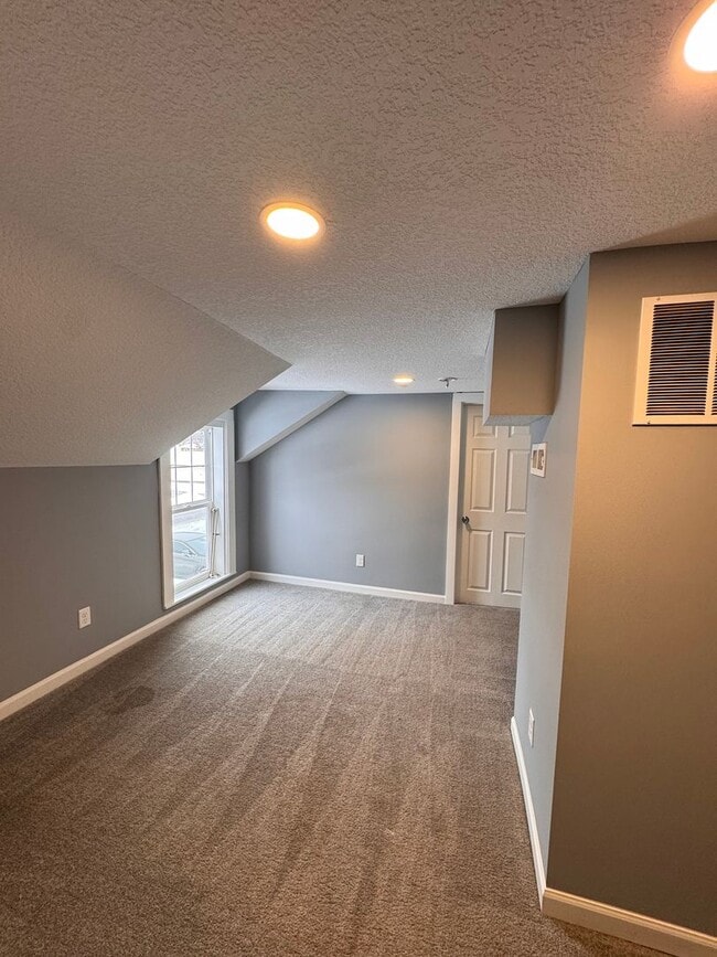 Building Photo - AVAILABLE NOW! Large 3 Bedroom, 2 Bathroom, with Extra Rooms and Two Car Garage in Anoka