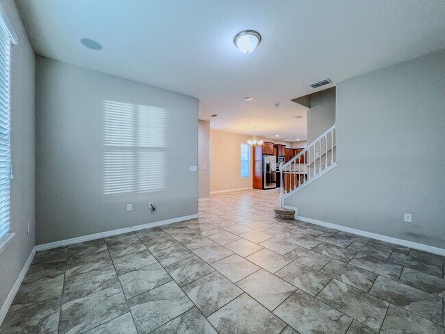 Building Photo - Spacious 4-Bedroom Townhome in Harmony – A Perfect Blend of Nature & Comfort!