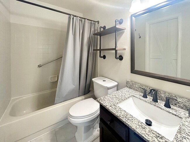 Building Photo - $0 DEPOSIT OPTION. DESIRABLE DAKOTA STATION SPLIT-LEVEL HOME WITH 3 BEDROOMS, 2 BATHS, AND SPACIO...
