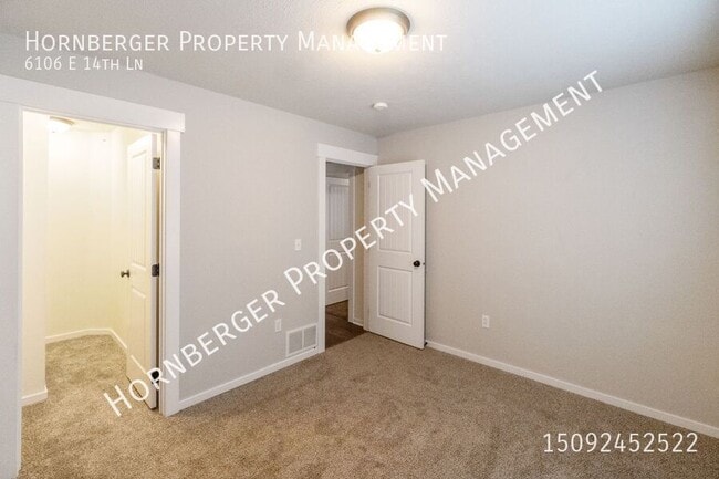 Building Photo - 6106 E 14th Ln