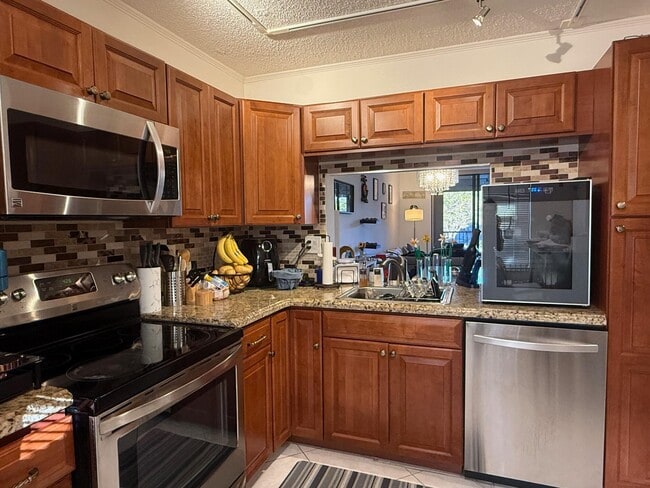 Building Photo - 3050 NW 42nd Ave