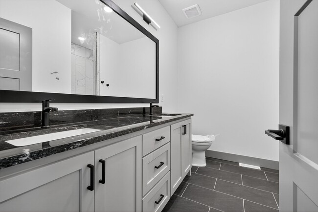 Building Photo - MUST SEE TOWNHOMES IN AMMON RIGHT OFF BEAC...