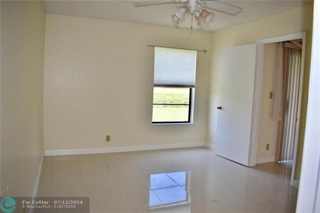 Building Photo - 9431 Boca Cove Cir