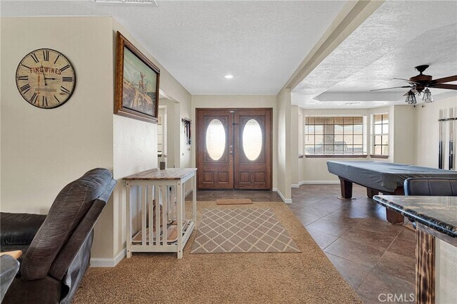 Building Photo - 25733 Roundup Way