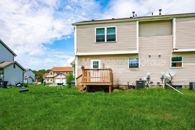 Building Photo - 7179 Feather Ct