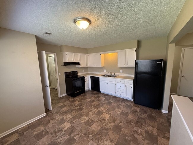 Building Photo - RC Quadplex