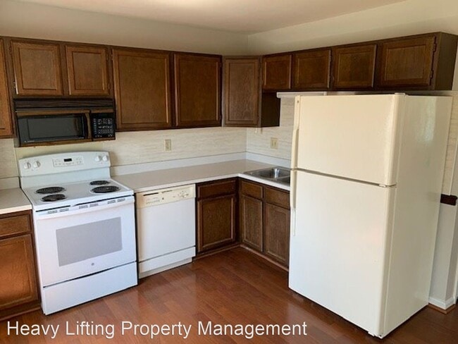 Building Photo - 3 br, 2.5 bath House - 6105 Spring Knoll Dr