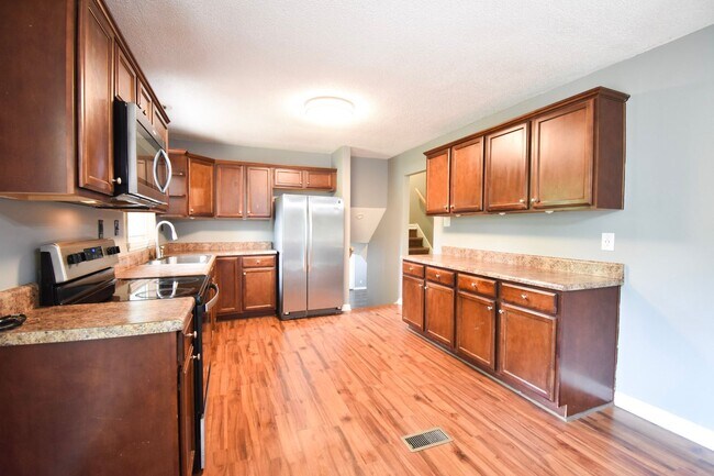 Building Photo - COMING SOON-4 Bedroom, 2.5 Bathroom Home- Pets Allowed