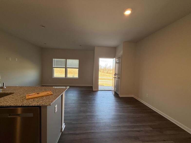 Living room looking towards front door - 157 Tigney Dr